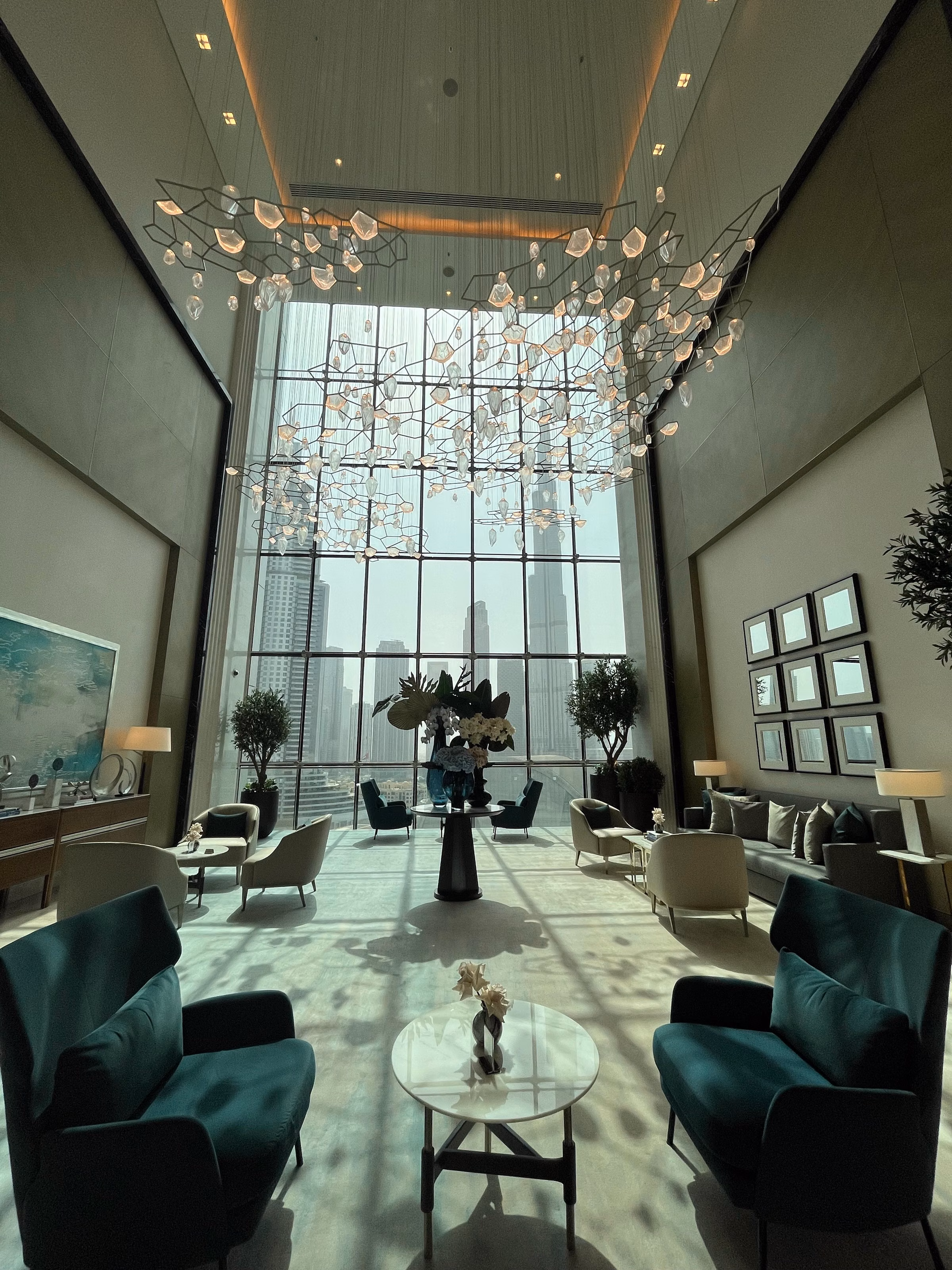 Elegant Dubai apartment interior with skyline, editorial photograph