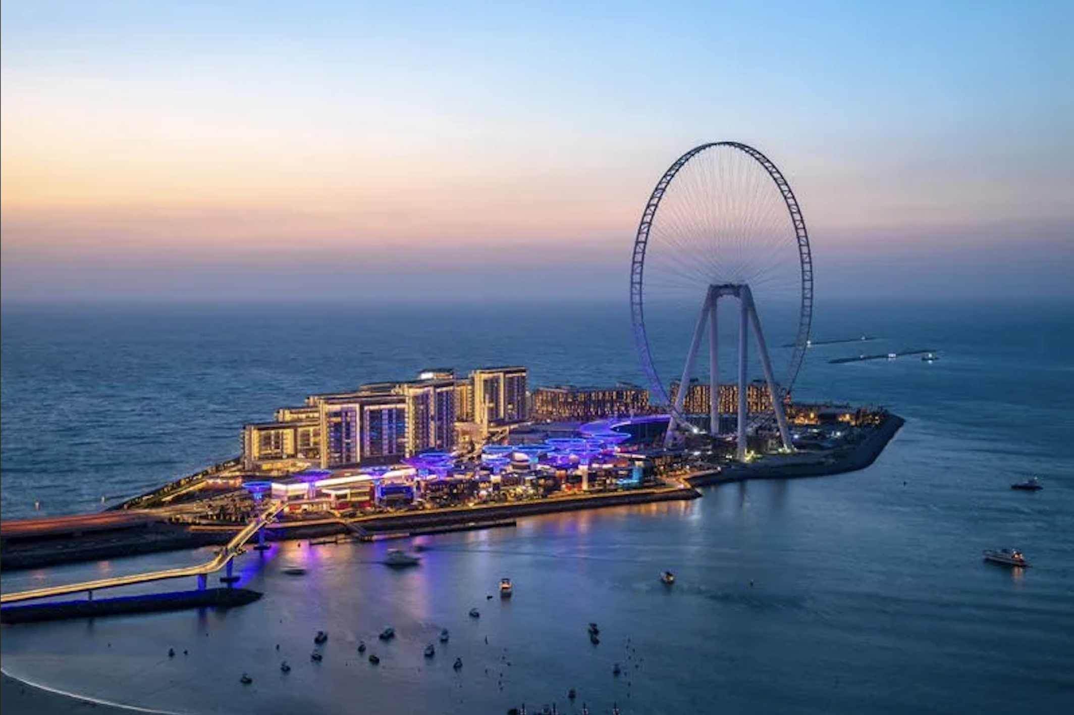 Ain Dubai and Bluewaters Island waterfront at dusk